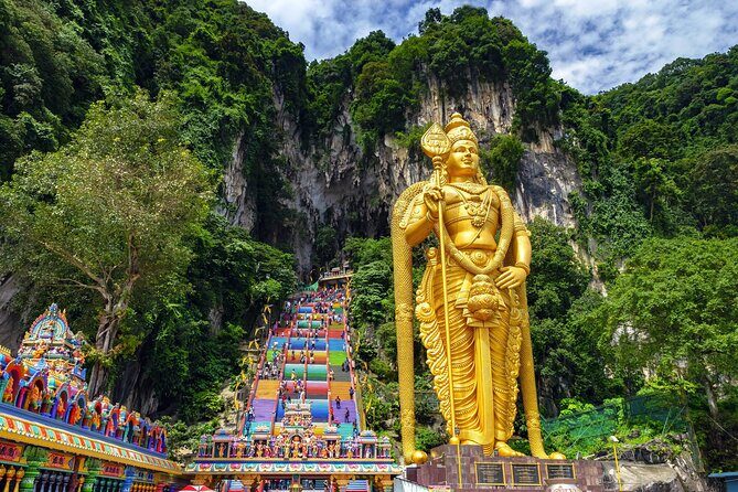 Batu Caves, Waterfalls, Hotspring, Batik & Pewter Tour with Lunch - Stop 3: Batu Caves climb, Temple Cave views, and respectful dress